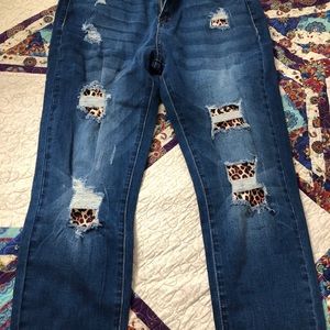 Distressed leopard patched skinny jeans